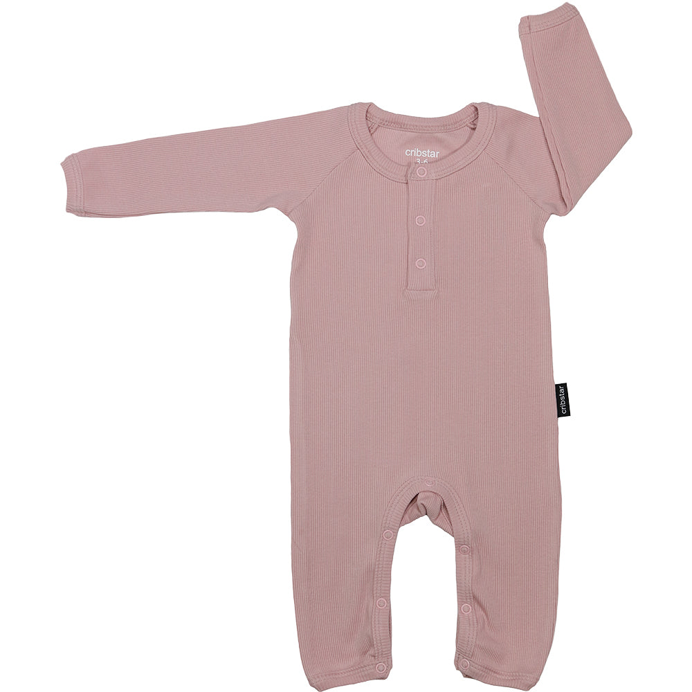 The Cribstar Ribbed Baby Romper in Dusty Pink is Available at Alf & Co. They are a lovely addition to a baby gift hamper