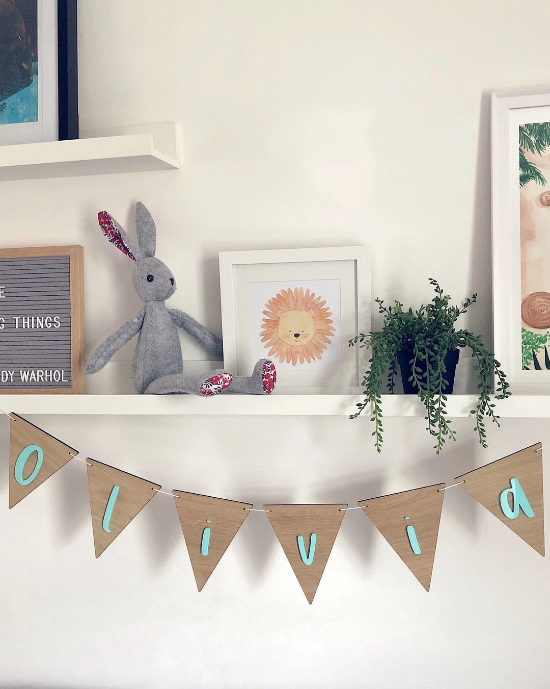 Personalised wooden bunting stocked at Alf & Co Nottinghams Children’s Shop. A lovely personalised baby gift