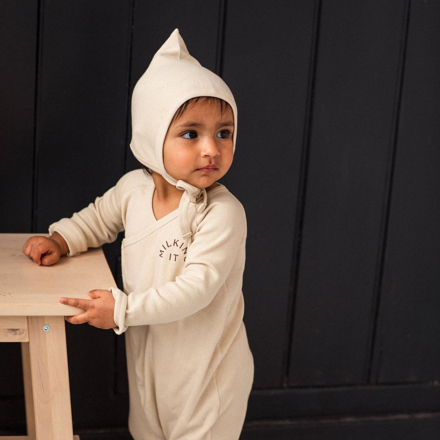 The Claude & Co Pixie Bonnet in Sand makes a lovely newborn gift.