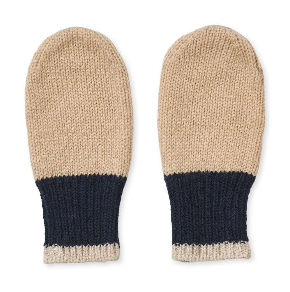 The lovely liewood pipi mittens in the midnight navy\oat mix are perfect for keeping little hands warm in the cold weather