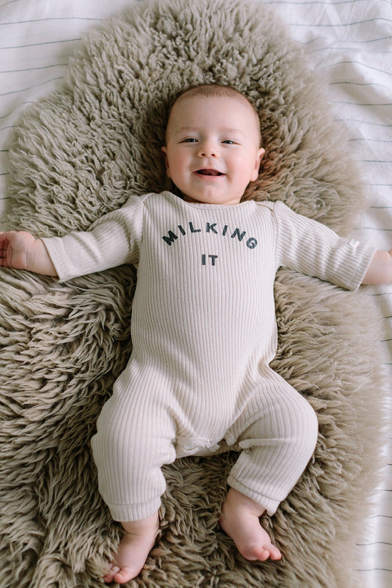 The gorgeous Claude & Co Milking It Oat Romper is stocked at Nottinghamshire children’s store Alf & Co.