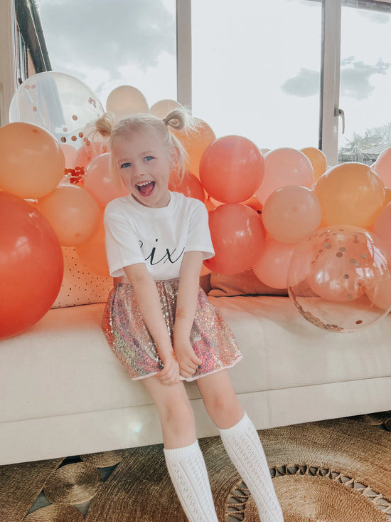 The Milestone Birthday T-Shirt-Age Six is the perfect finishing touch when celebrating your little ones sixth birthday.