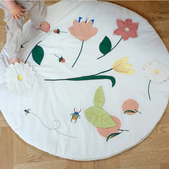 Load image into Gallery viewer, The Fabelab Flower activity blanket makes a lovely gift for any newborn. 

