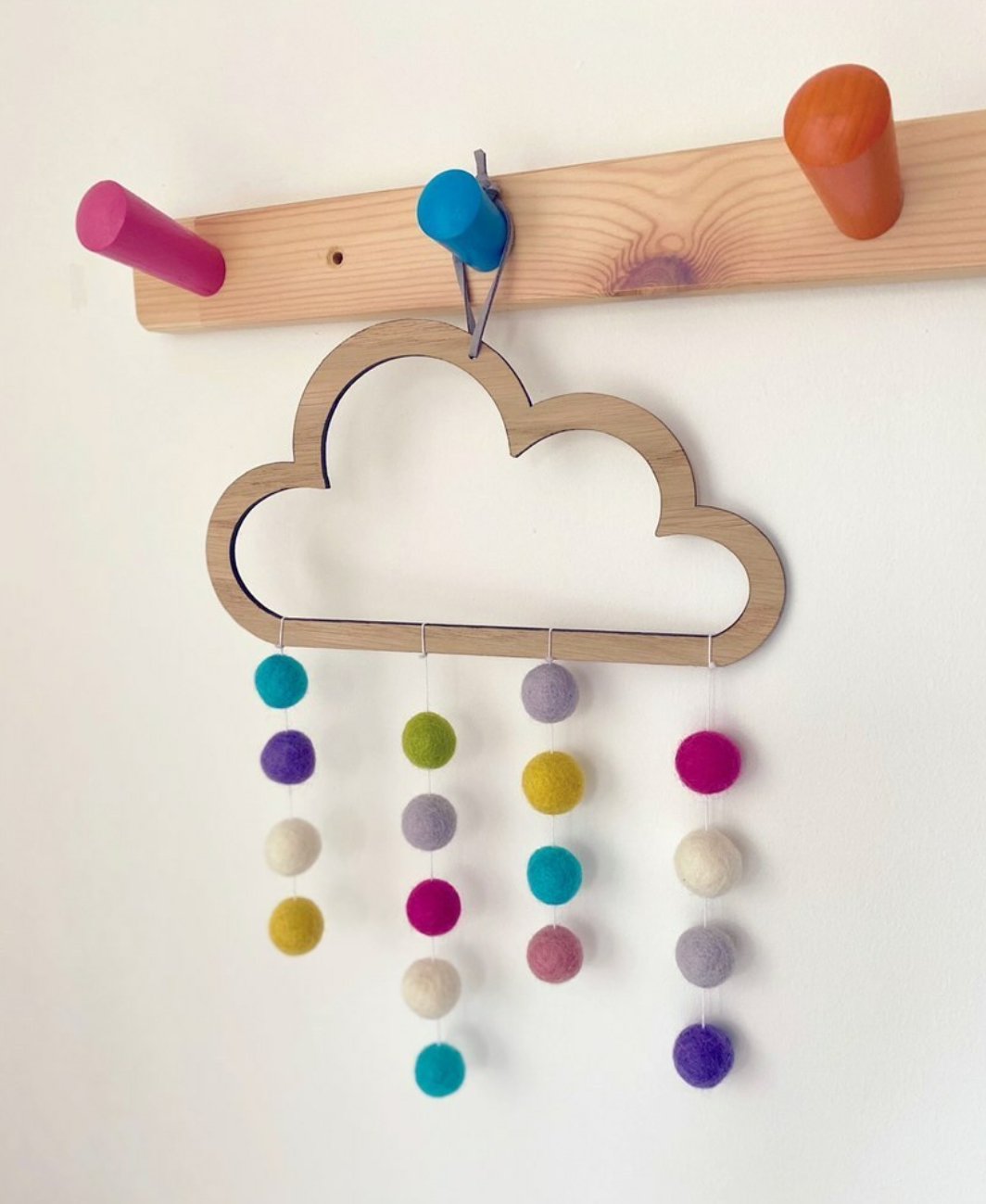 Pompom Rainbow Cloud Mobile stocked in Nottinghams Children’s Shop perfect decor for your little ones room. It also makes a beautiful new baby gift 