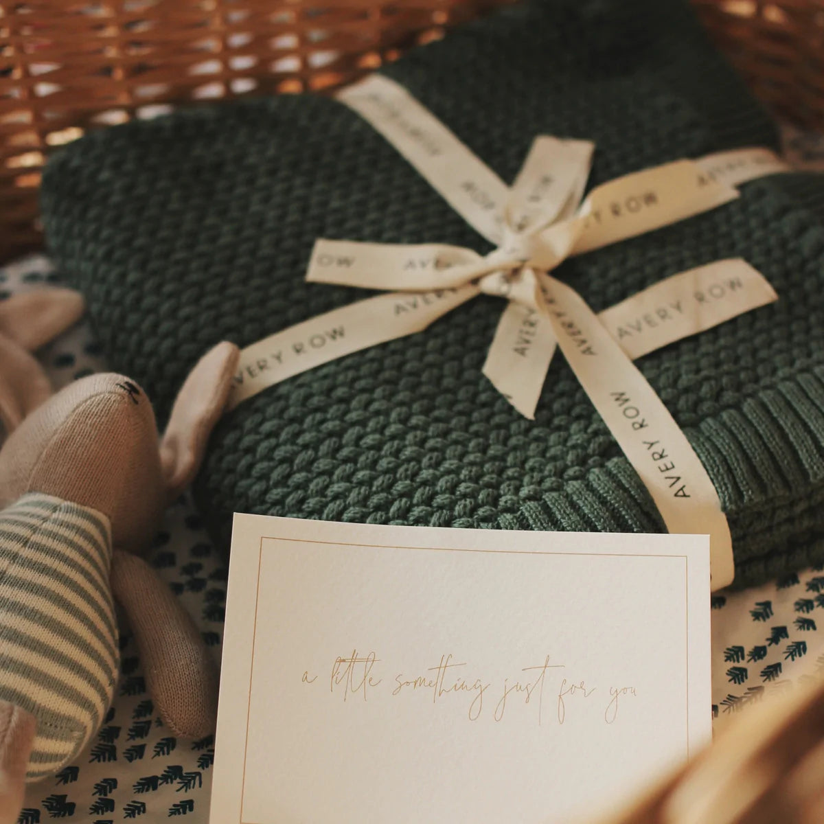 The Avery Row Pine Green Knitted Blanket makes the perfect baby shower gift 