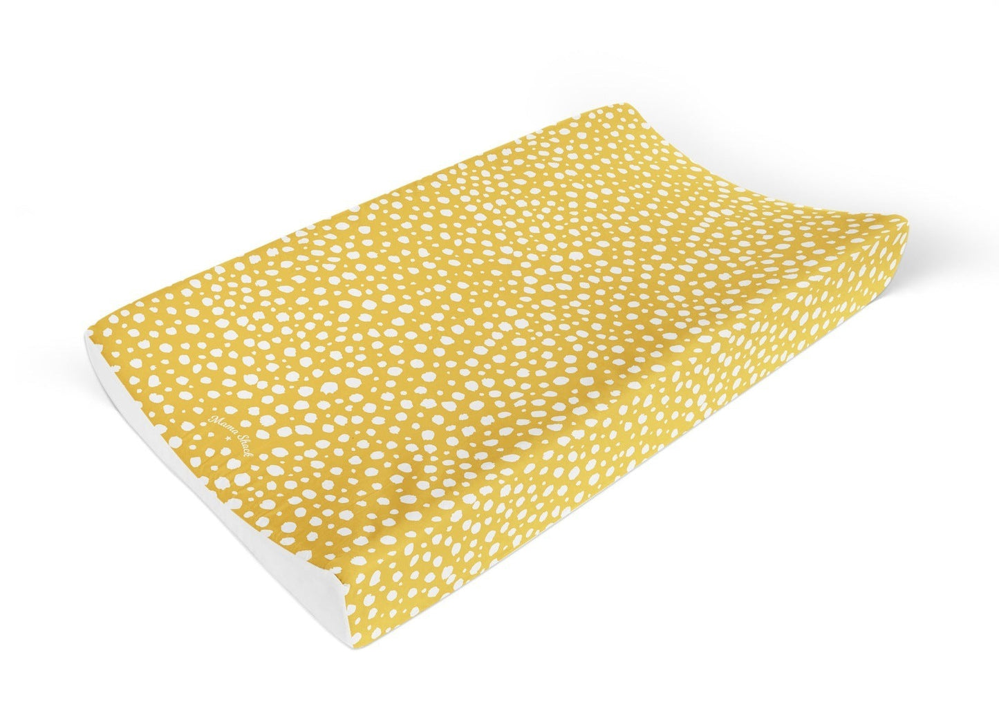 Mama Shack Anti Roll Changing Mat mustard Spotty is a lovely addition to any nursery. It’s also a lovely gift for a newborn baby and mother. 